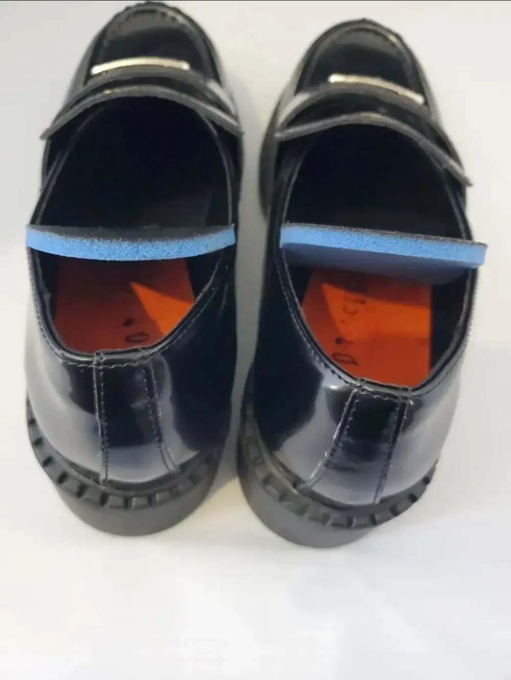 Prada Spazzolato Brushed Leather Loafers with Metal Triangle Logo
